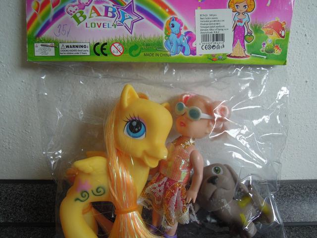 Set of plastic doll and toys