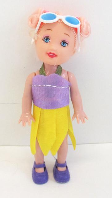 Set of plastic doll and toys