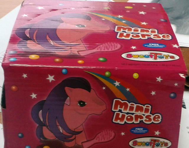 Plastic horse with sweets