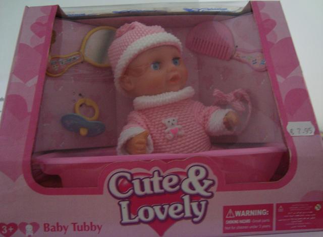 Plastic doll with accessories