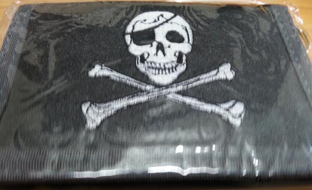 Black wallet with skull and crossbones