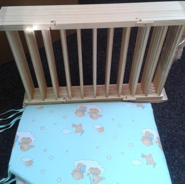 Babies' playpen with a gate