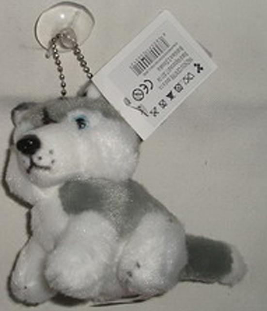 Plush dog with suction cup