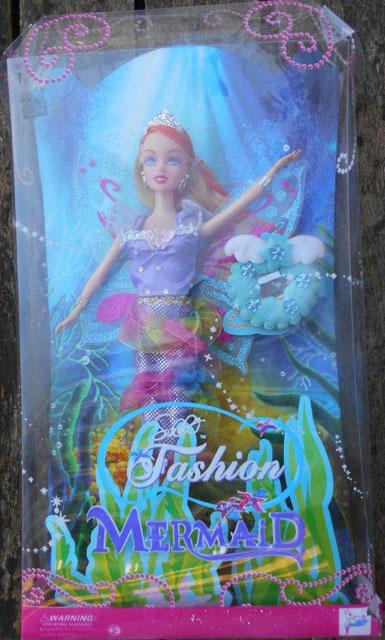 Plastic doll with accessories