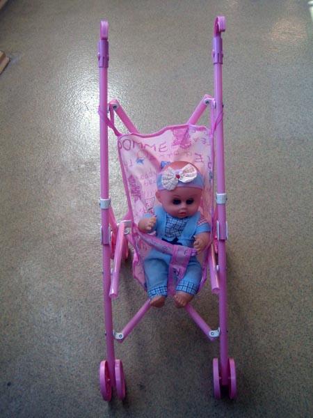 Toy pushchair with doll