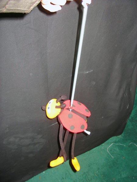 Soft toy with spring