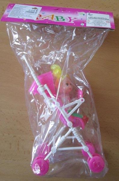 Plastic doll with toy pushchair