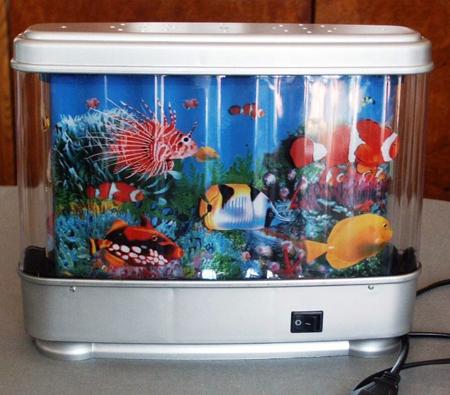 Table luminaire with a motif of a movable seabed