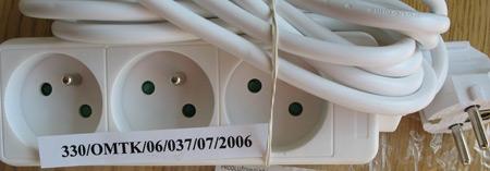 Three-socket extension cord with a child safety switch