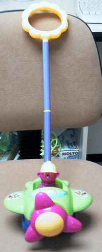 Push-along toy in the form of an aeroplane