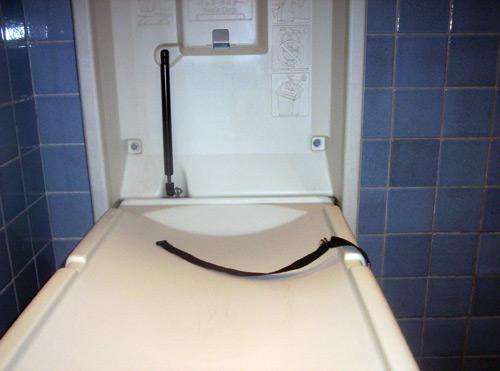Wall-mounted baby changing table