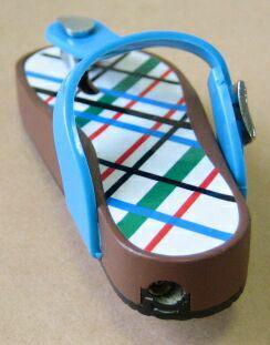 Novelty lighters in the form of: 1. a slipper, 2. a barrel
