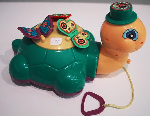 Pull-along toy turtle with butterflies