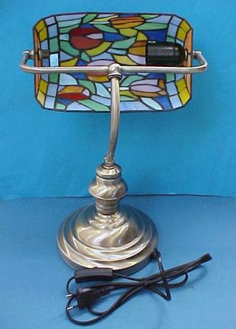 Portable luminaire – Tiffany's banker's table lamp.