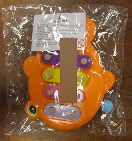 Plastic toy flower and xylophone