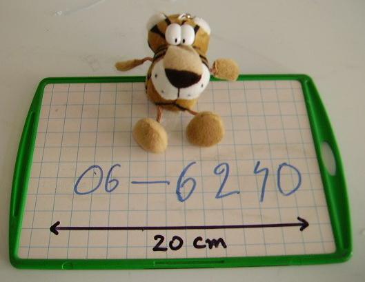 Key ring in the form of a stuffed fabric soft toy animal (tiger, dog, mouse, cow or pig)