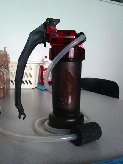 Portable water microfilter and replacement cartridge