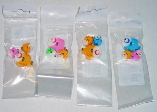 Set of erasers with a child motive in the form of a fish and a butterfly