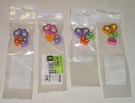 Set of erasers with a child motive in the form of a fish and a butterfly
