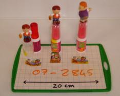 Lollipop with gadget - confectionery containing a loose non-edible element