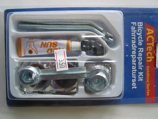 Rubber solution (glue) in tubes on which is printed "RED SUN" in two different bicycle repair kits