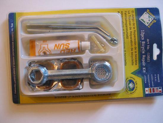 Rubber solution (glue) in tubes on which is printed "RED SUN" in two different bicycle repair kits