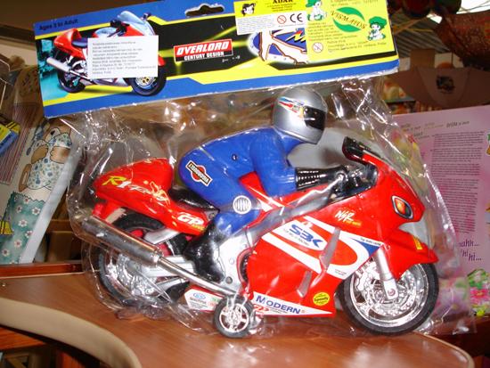 Plastic toy β motorcycle with run-out device
