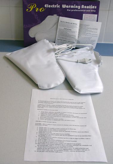 Electric warming booties used to dry nail varnish
