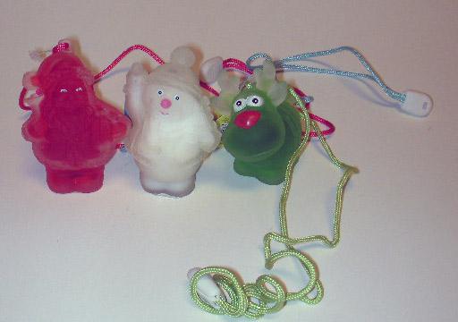 Figures on a string filled with bath gel