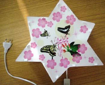 Table lamp "Present Light" in the shape of a star