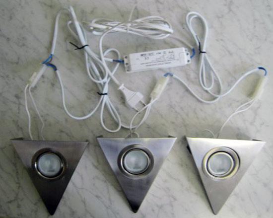 Luminaires and a. c. supplied step-down converter for filament lamps