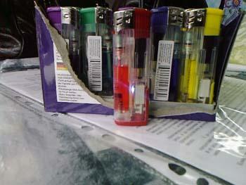 Novelty lighters with flashing lights
