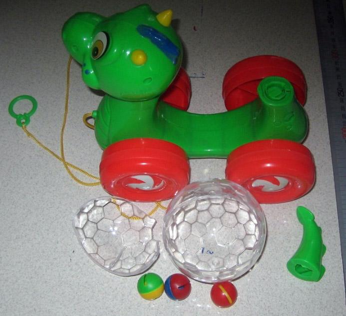 Pull-along toy - dinosaur
