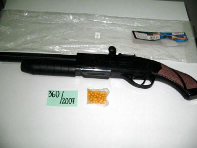 Toy ball gun with laser