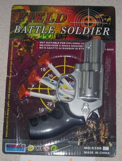Toy gun with darts