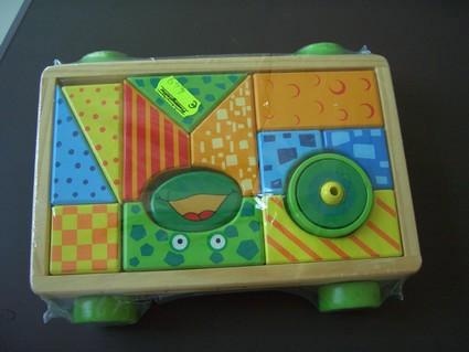 Wooden toy car with bricks