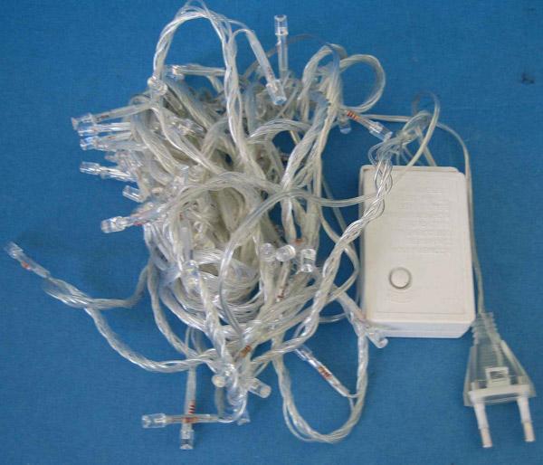 Lighting chain with LEDs and flashing unit