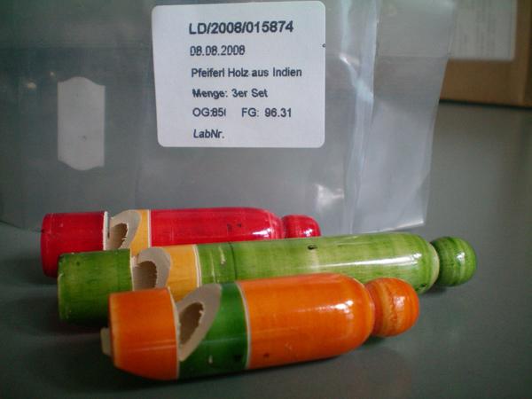 Set of coloured wooden pipes