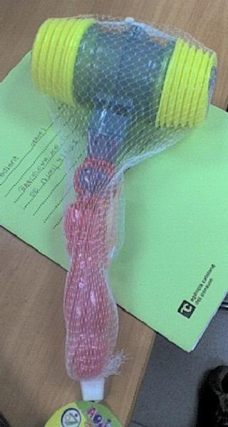 Toy hammer with sound effects, battery-operated