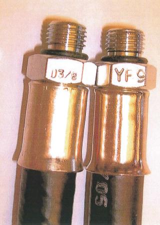 Dry suit inflation hoses - Flow restriction orifice