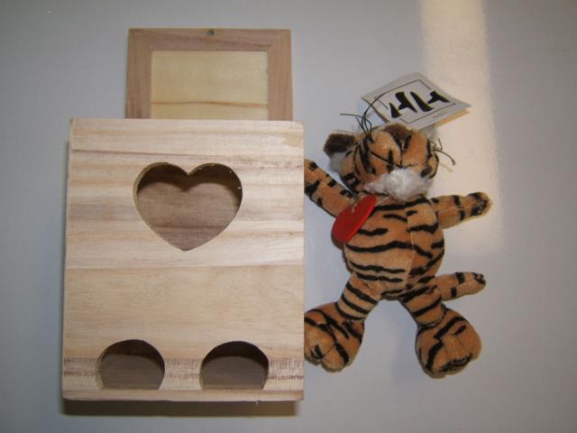 Soft toy in a wooden box