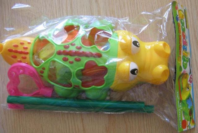 Push-along toy - Cocodrilo Con Baston