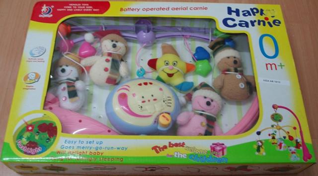 Musical rotating toy - Happy Carnie
