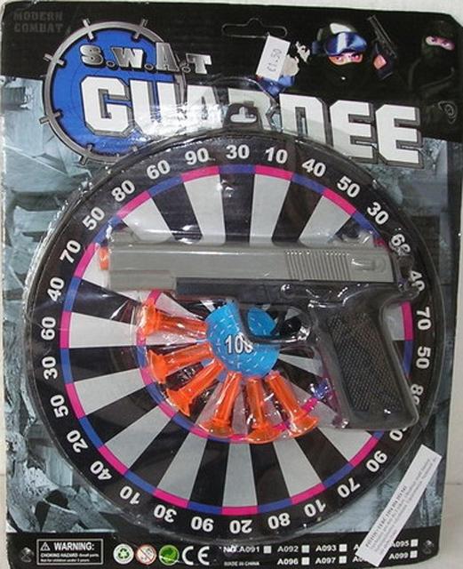 Children’s set - pistol and dartboard with arrows