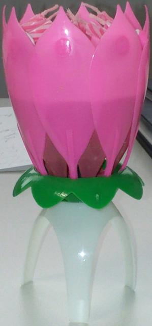 Plastic flower with candles