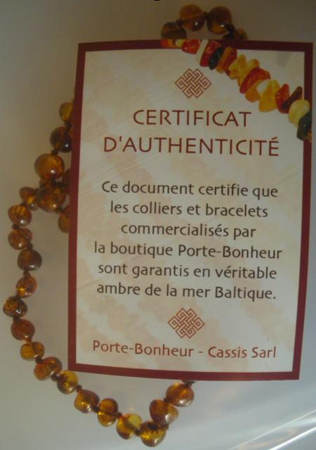 Amber baby necklace "Porte Bonheur"