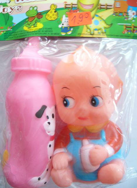 Plastic doll with bottle