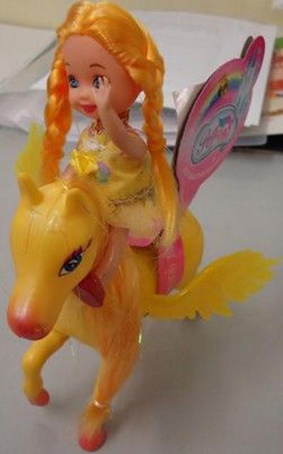 Plastic doll with winged horse