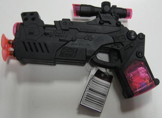 Toy gun with sweets