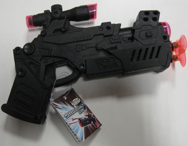 Toy gun with sweets